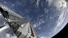 Starlink satellite orbits above Earth